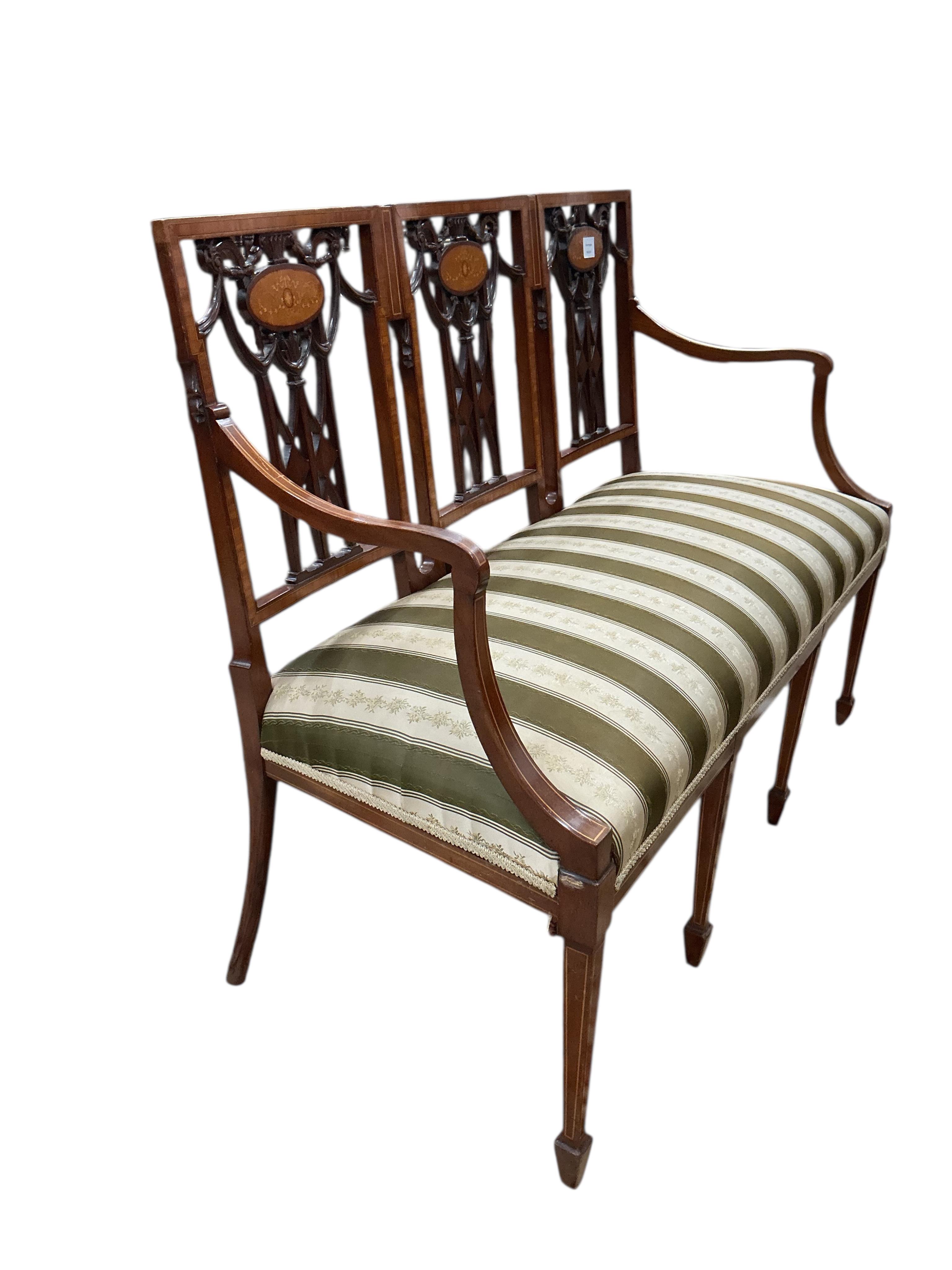 An Edwardian Sheraton Revival inlaid mahogany triple chair back settee, width 120cm, depth 50cm, height 96cm